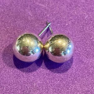Silver ball earrings.